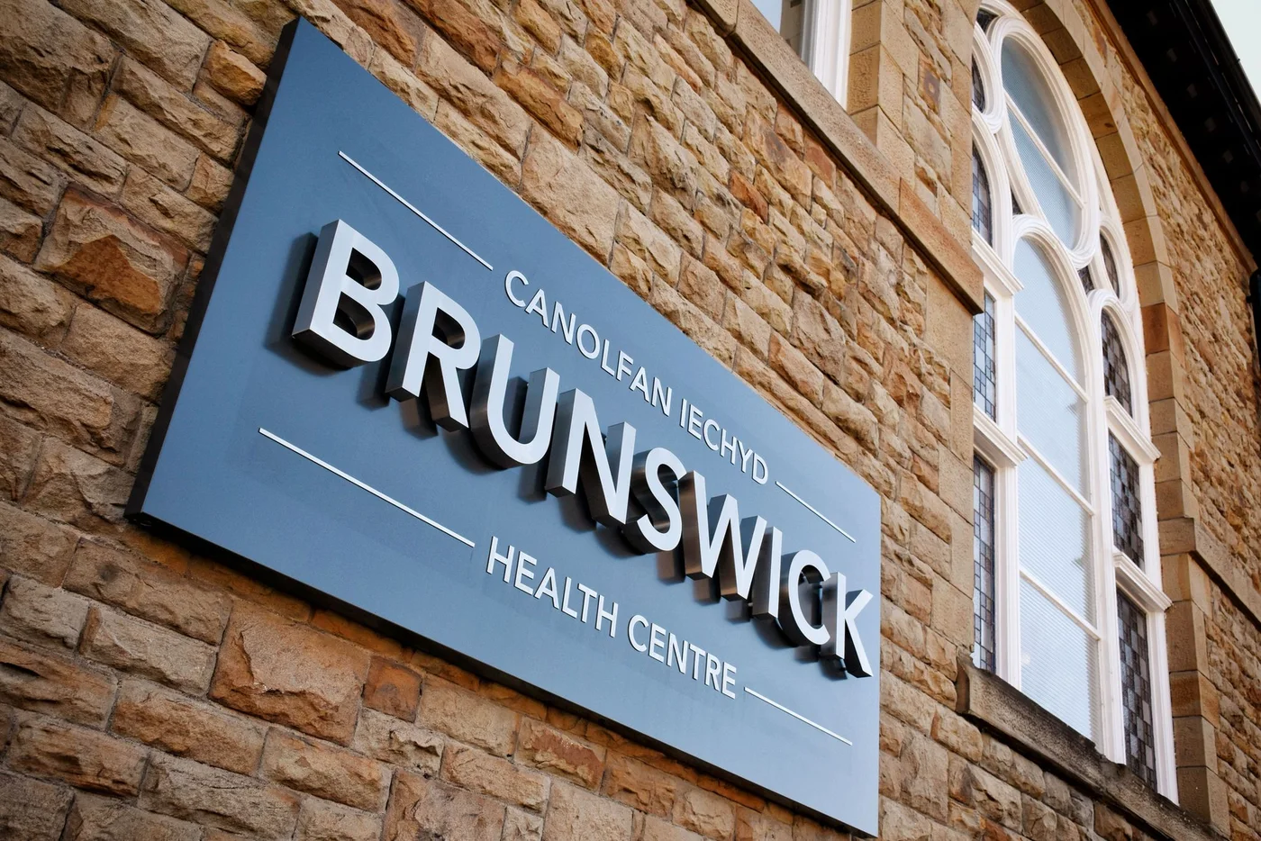 Brunswick Health Centre sign on the building exterior