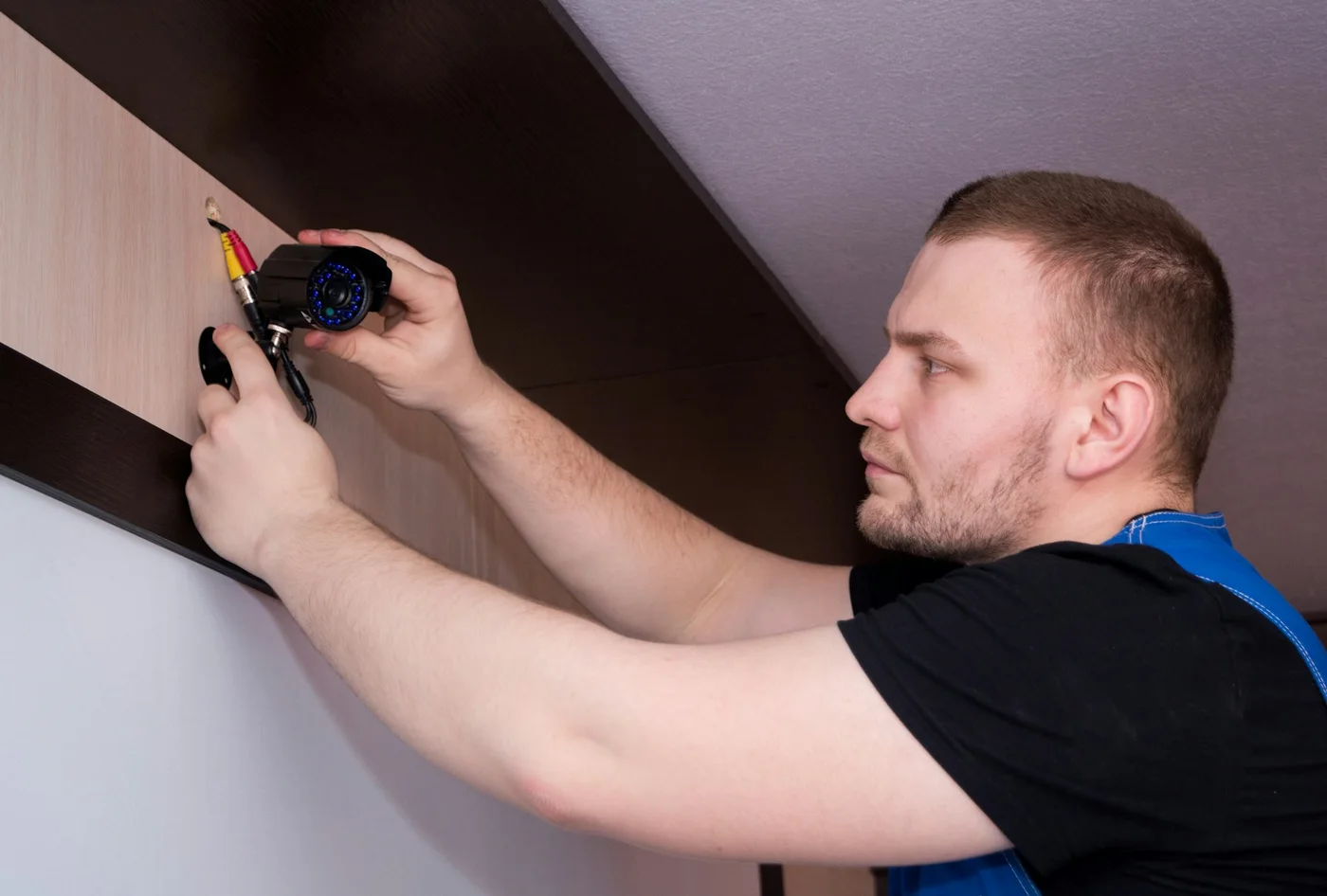 Engineer working on an installation inside a property